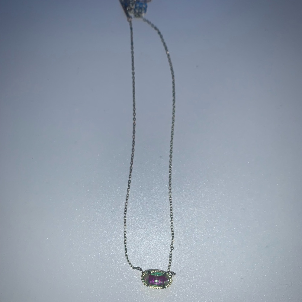 Kendra Scott necklace. It is slightly tarnished. But still cute!